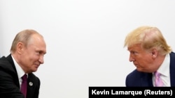 Američki predsjednik Donald Trump sa ruskim predsjednikom Vladimirom Putinom tokom G20 samita u Japanu