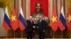 Președintele rus, Vladimir Putin și omologul său vietnamez, To Lam.