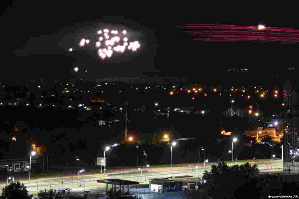 Ukrainian air defenses fire onto incoming Iranian-made drones during a Russian attack on Kyiv on May 30. Russia launched a fresh wave of drone attacks, killing at least one person and wounding several others, Ukrainian authorities said, adding that most of the drones were shot down by Ukraine's air defenses.
