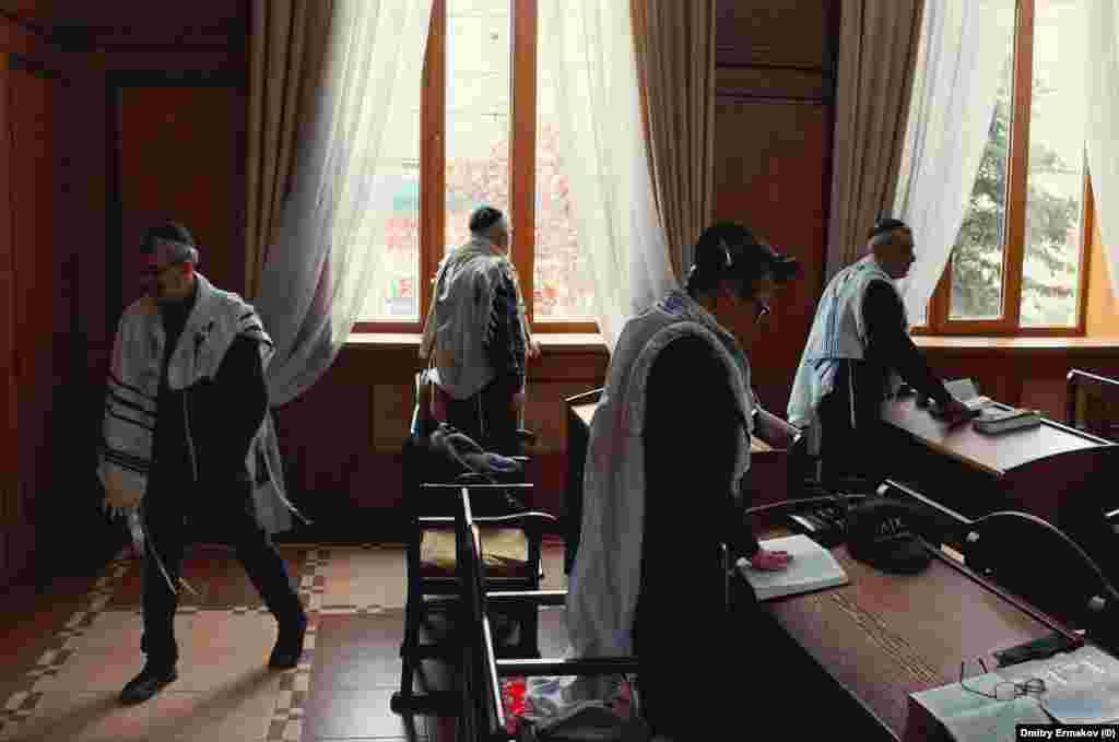 Jews pray inside the Derbent synagogue in April 2023. The Jewish population of Daghestan now say they are in fear for their lives. Recent images of the community are rare, but in April 2023, Russian photographer Dmitry Ermakov made an extensive photo report on the Jews of Derbent, a city in Daghestan where most of the minority resides. The following photos were made on that trip. 