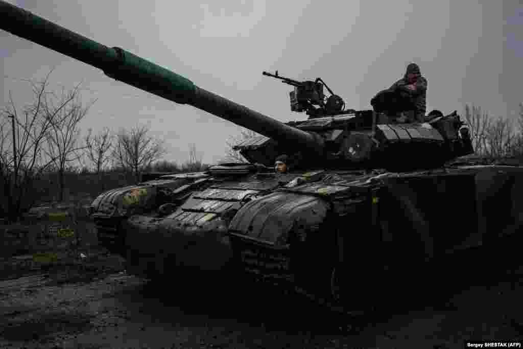Kyiv's fighters are still able to resupply their troops in the beleaguered city from nearby Chasiv Yar via "the Road of Life," where burnt-out vehicles and craters mark the muddied and devastated landscape. "If you cut (the road), everyone in Bakhmut is dead. No supplies. No ammunition. No food. Nothing. It would be completely cut off," a soldier told AFP while his crew stacked rows of newly delivered shells.