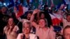 Сторонницы «Национального объединения» празднуют победу, 30 июня 2024 года