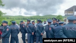 Armenia - Police block a road leading to Kirans village, May 19, 2024.