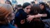 Жени се прегръщат по време на шествие за равни права и срещу насилието над жени на 8 март 2023 г. в София.