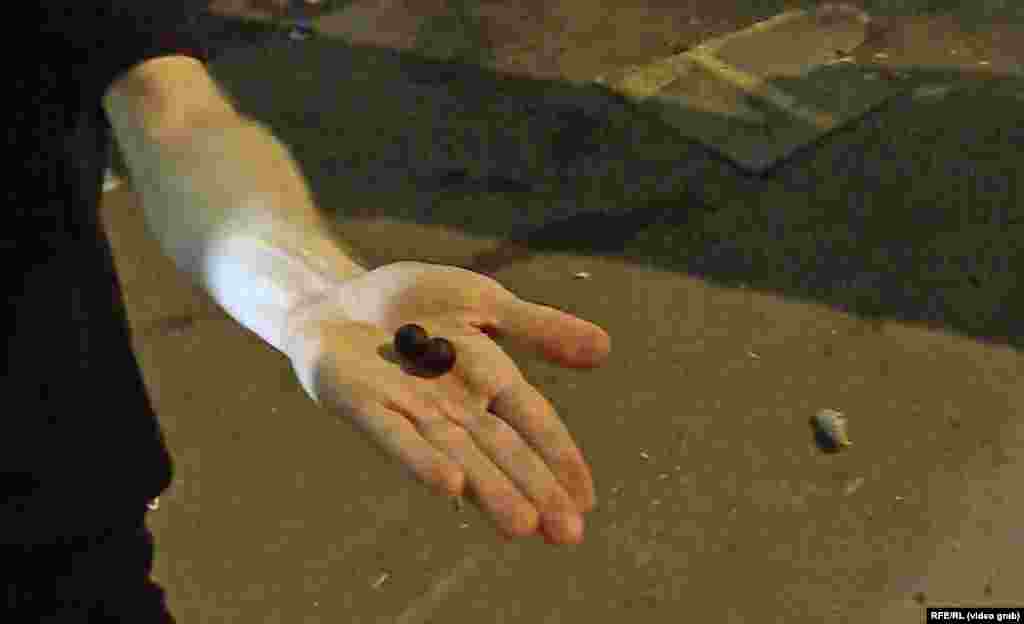 A protester showed a Current Time cameraman what appeared to be rubber projectiles that were allegedly fired during the May 1 demonstration in Tbilisi. Current Time is the Russian-language TV and digital network led by RFE/RL in partnership with VOA. 