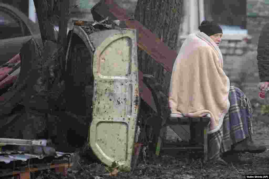 Residents huddled outside in the cold while emergency responders arrived at the attack sites.