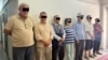 УКМК кармаган "Бүтүн Кыргызстан" партиясынын мүчөлөрү. Сүрөттү атайын кызмат таратты.