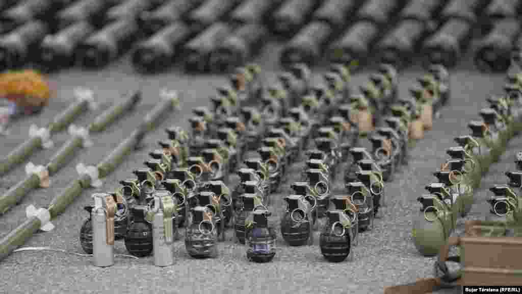 Hand grenades confiscated from the northern, Serb-majority district where an attack on an Orthodox monastery left four people dead, including a police officer, were exhibited to journalists by Kosovar police on September 25. 