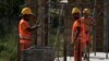 Bihac, Bosnia and Herzegovina -- Foreign workers on a construction site in the north of Bosnia