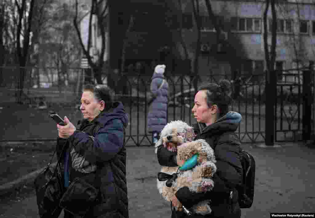 Rocket fragments fell onto a kindergarten in the Sviatoshynskiy district of the capital, according to Kyiv Mayor Vitali Klitschko, while an apartment building and a car caught fire in other areas of the city.