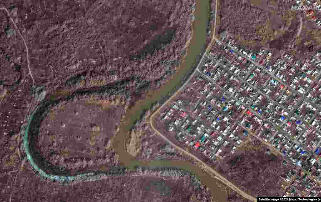 Before-and-after satellite views captured on April 1, 2023, and April 10 of this year show the inundation of the city of Orsk, which straddles the Ural River. Orsk, a city of nearly 240,000, is the second-largest city in Russia's Orenburg region, located on the steppe about 100 kilometers southeast of the southern tip of the Ural Mountains.