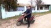 67 year old Klavdija Ivanivna cooks and shelters Ukranian soldiers at Mikolayevsk region, drives mopped to deliver food, February 2023.