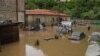 Armenia - Flooded homes and cars in the town of Alaverdi, May 26, 2024.