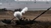 The Israeli military fires shells toward the Gaza Strip on October 28. As the conflict in the Middle East rages on, China has moved to take up a peacemaker role, but what can Beijing actually achieve?