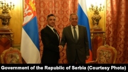 Serbian Deputy Prime Minister Aleksandar Vulin (left) meets with Russian Foreign Minister Sergei Lavrov on August 14.