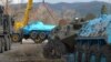 Българските БТР-6о при товаренето им на гара Курило, за да бъдат дарени на украинската армия.