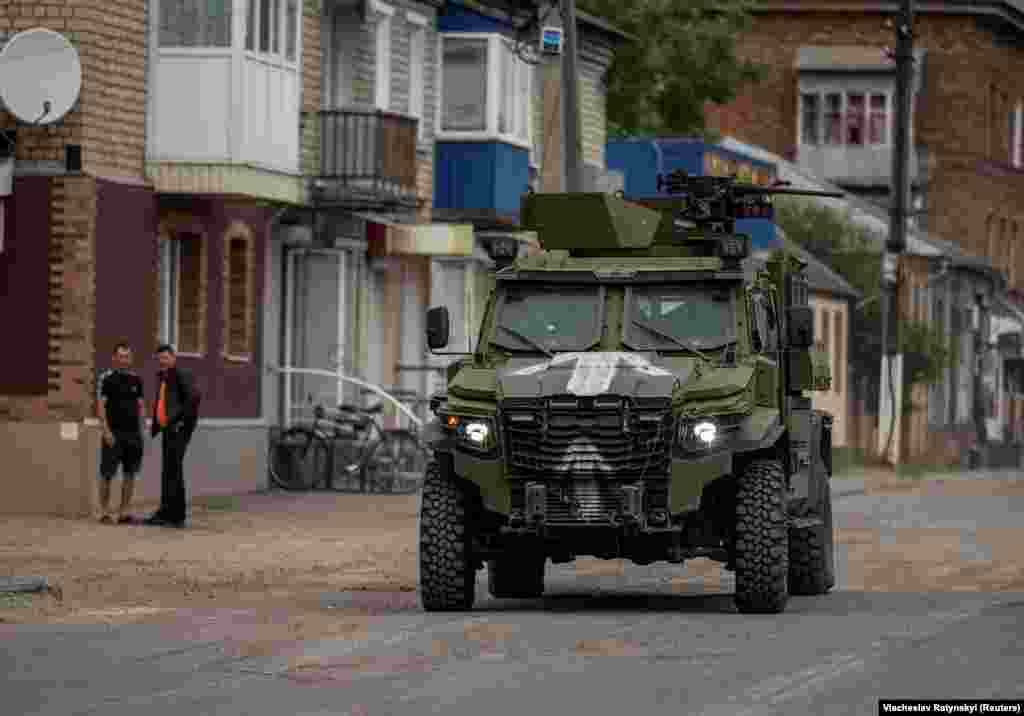 An armored vehicle is seen in the Ukrainian border town of Vovchansk, around 12 kilometers from Russia’s Shebekino, on June 5. Ethnic Russian militants using Western-supplied Ukrainian equipment have made repeated incursions into the Belgorod region in recent days. 