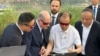 Scholz tokom posjete Kini u industrijskom centru Čongkuingu, 14. april 2024. 
