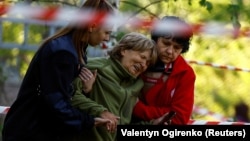 Дитина серед загиблих: наслідки удару Росії по Києву у Міжнародний день дітей (фотосвідчення)