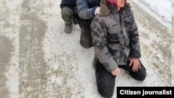 Скриншот с видео, снятого во время рейда против мигрантов в Санкт-Петербурге. 
