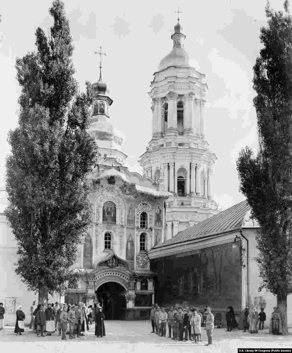 The main entrance to the lavra complex photographed in 1918. According to Orthodox Christian lore, soon after the death of Jesus, traveling apostle Andrew pointed to the elevated western bank of today’s Dnieper River where the lavra now stands and vowed that "God's grace will shine on these hills. There will be a great city here and God will build many churches." 