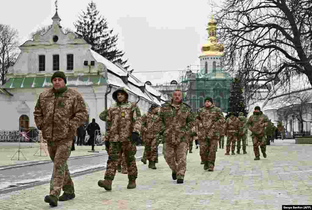 Ukrainian soldiers leave the lavra in January 2023. On March 10, Ukraine’s Culture Ministry confirmed that a lease that had allowed the church to use part of the monastery would be terminated. 