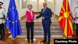 European Commission President Ursula von der Leyen (left) shakes hands with Macedonian Prime Minister Dimitar Kovachevski in Skopje on July 14.