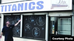 Richard Hyman, great-grandson of "Titanic" survivor Joseph Abraham Hyman, in front of the family business in Manchester, England, his great-grandfather started a year after the "Titanic" sank.