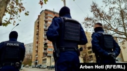 Police patrol the streets of in North Mitrovica on December 9.