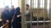 Віталій Марків спілкується з адвокаткою Донателлою Рапетті, Павія, Італія, 25 січня 2019 року