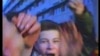 Mihai Demetriade avea 16 ani c&#226;nd au &#238;nceput protestele &#238;n Brăila. O filmare de amator l-a surprins c&#226;nd striga &#238;n fața Comitelui Județean. Captură din video de Lucian Dinu.