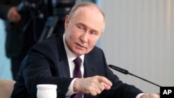 Владимир Путин