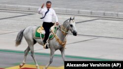 Turkmenistan Parade -- Turkmenistan's President Gurbanguly Berdymukhammedov attending a parade in September 2021