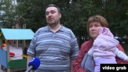 Pyotr and Yelena Khomsky say the case is aimed at "frightening us and other activists."