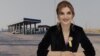 Armenia - A photo of Vagharshapat Mayor Diana Gasparian juxtaposed against a view of a gas station owned by her father-in-law.