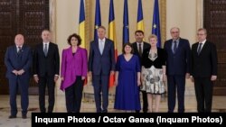Judecătorii Curții Constituționale, la un eveniment de la Palatul Cotroceni, alături de președintele Klaus Iohannis (fotografie de arhivă).