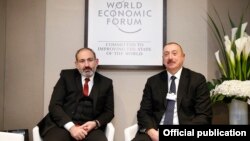 Встреча премьер-министра Армении Никола Пашиняна и президента Азербайджана Ильхама Алиева в Давосе 22 января 2019 года