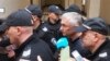 Съдебната охрана води Джейхан Ибрямов в Софийския градски съд, 5 октомври 2024 г.