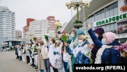 A group of women form a chain of solidarity in Minsk with anti-government protesters on November 9.