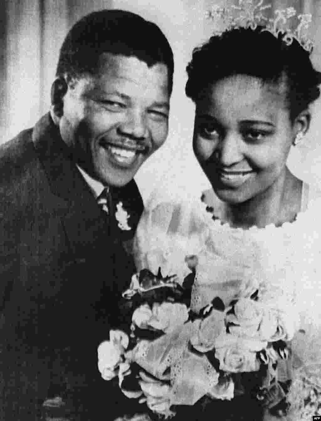 Nelson Mandela poses with his second wife Winnie on their wedding day in 1957.