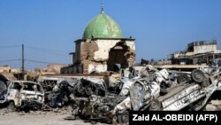 A picture taken in July shows the dome of the destroyed Al-Nuri Mosque in the Old City of Mosul, a year after the town was retaken by Iraqi government forces.