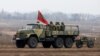 Drapel transnistrean pe un tanc, în timpul unor exerciții militare comune ale armatei transnistrene și ale armatei ruse din 2019.