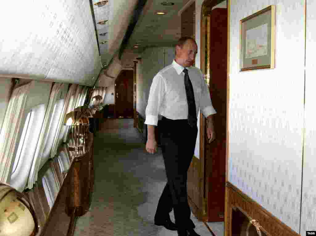 Putin on board one of his presidential planes. According to the report, he has 43 airplanes at his disposal. 