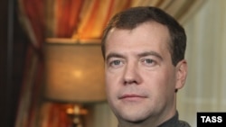 Medvedev, seen here recording a clip this month for his video blog, says "freedom of speech must be ensured by technological innovations." He doesn't say whose.