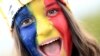 O tânără pictată pe față în culorile steagului României. România a pierdut meciul din optimi cu Olanda, scor 0-3.