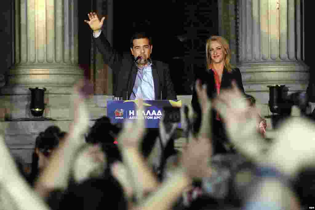 Greek parties on both the far left and far right made gains in the vote. Alexis Tsipras (left), the leader of the Coalition of the Radical Left (Syriza), and candidate Rena Dourou celebrate with supporters in Athens.