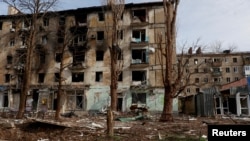 Авдеевка шаарындагы кыйраган үйлөр 