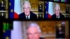 Michel Barnier pe monitoare TV în timpul unui interviu despre criza politică din Franța. 3 decembrie 2024. 