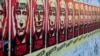 Russian Blogger Charged With Insulting Authorities For Post Mocking Putin