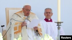 Pope Francis presides over an open-air mass in Budapest on April 30.